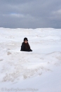 Me behind an ice pile on Lake Superior